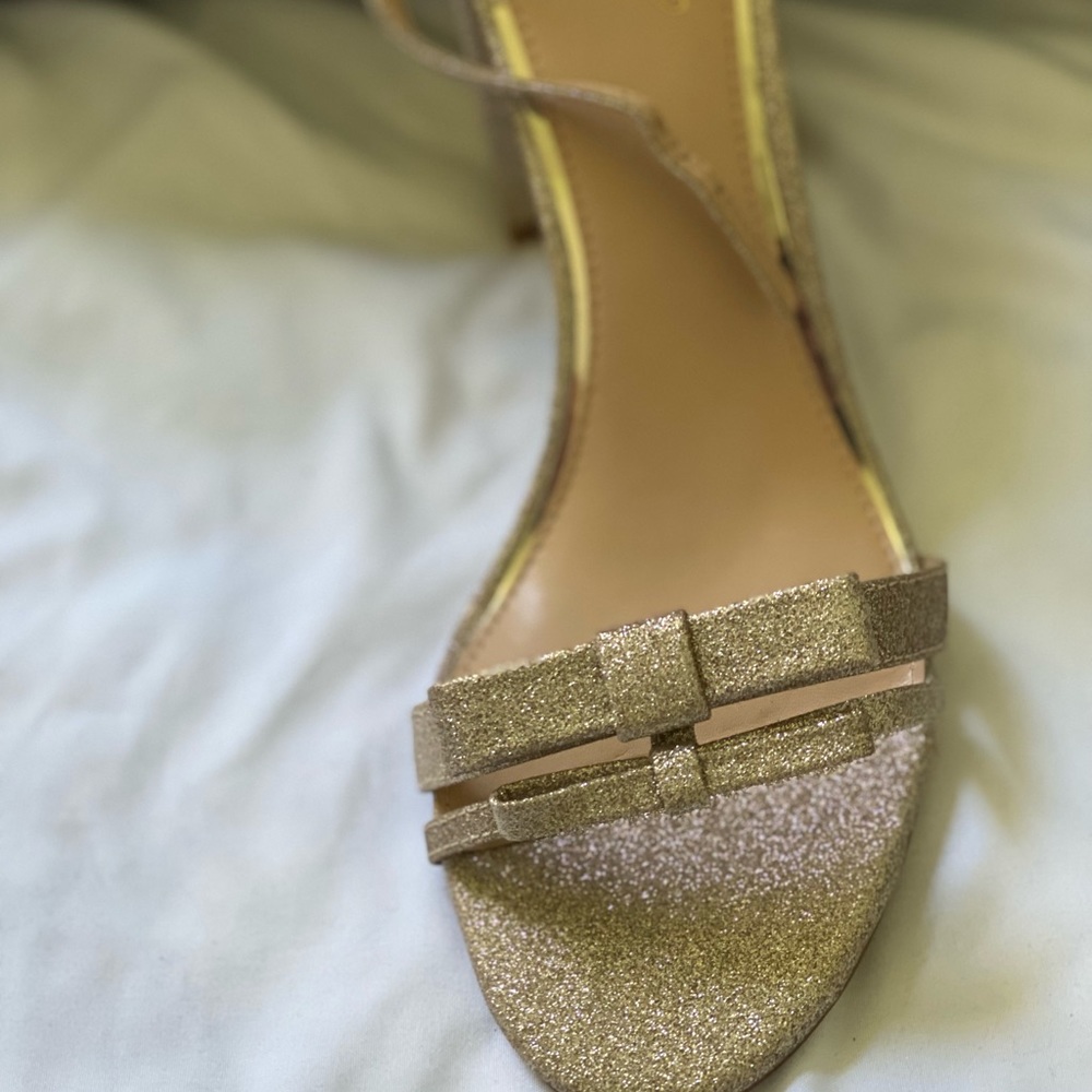 Gold glitter sandals. I never wore them. Size 10